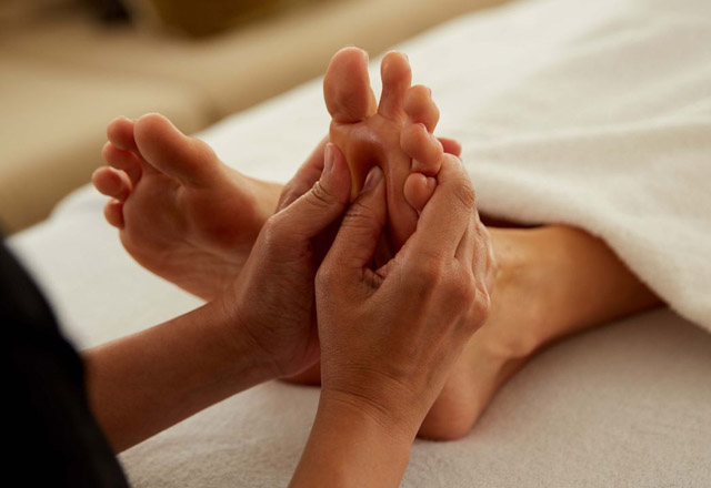 Foot reflexology massage